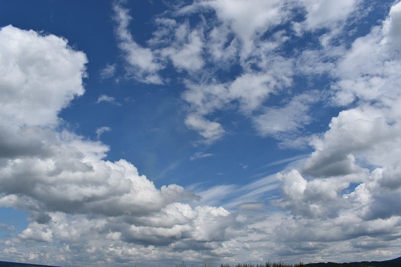 Cumulus and altocumulus clouds