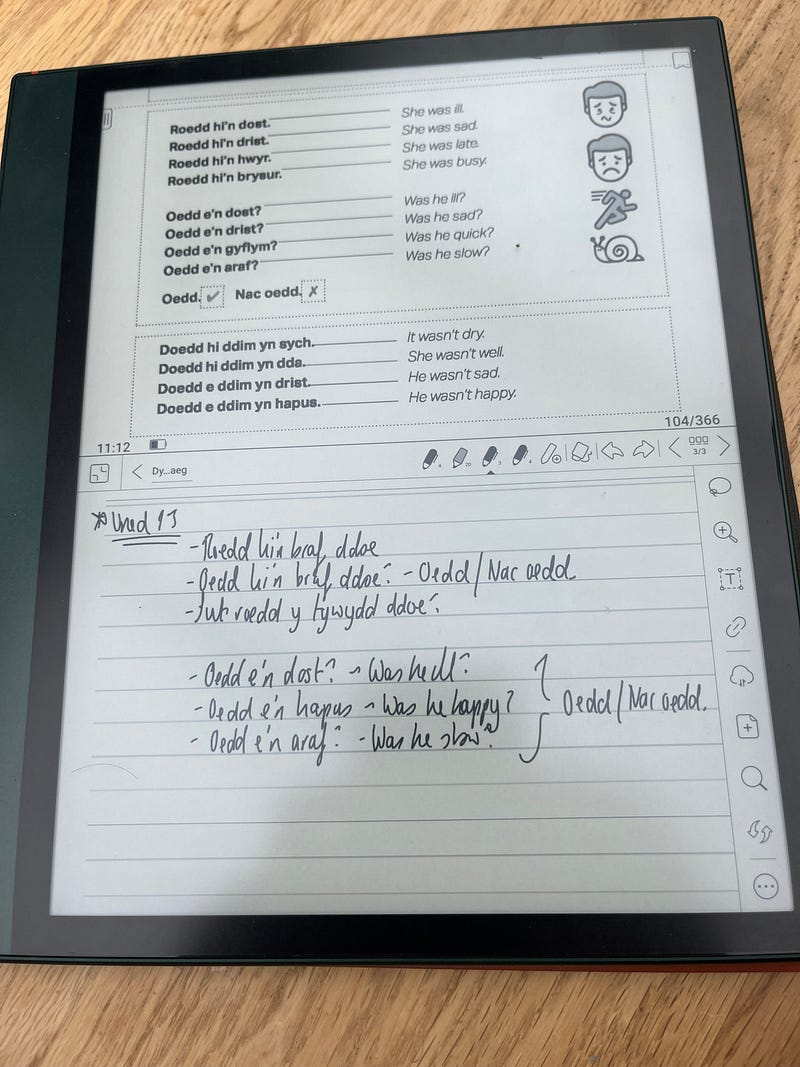 Split-screen view of coursebook and notes