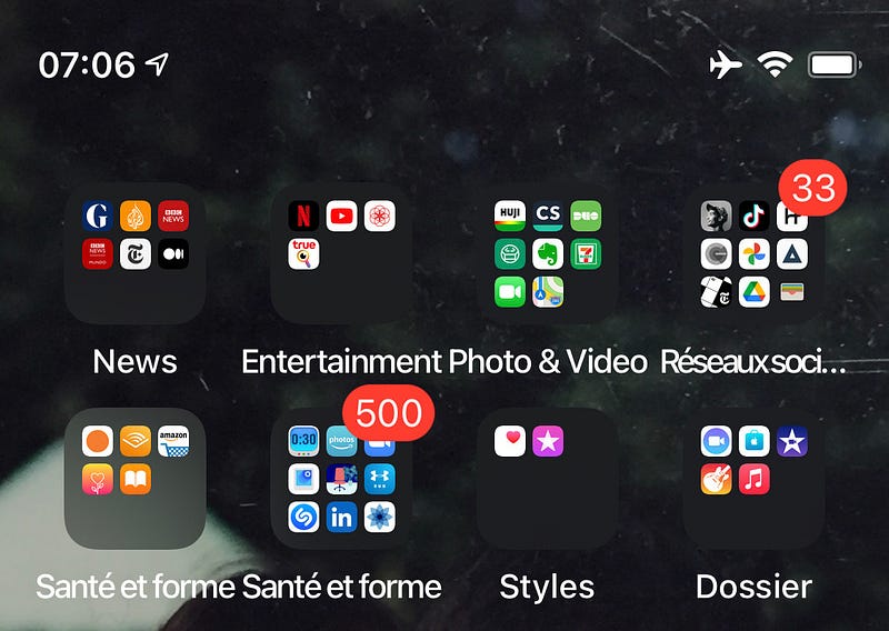 My semi color-coded app folders after decluttering.