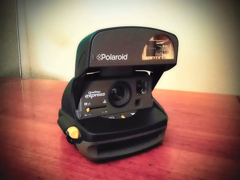 The Polaroid OneStep captured with the Fujifilm mini Evo