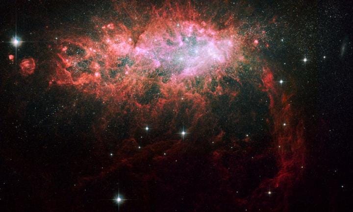 Star-forming galaxy affected by black hole winds.